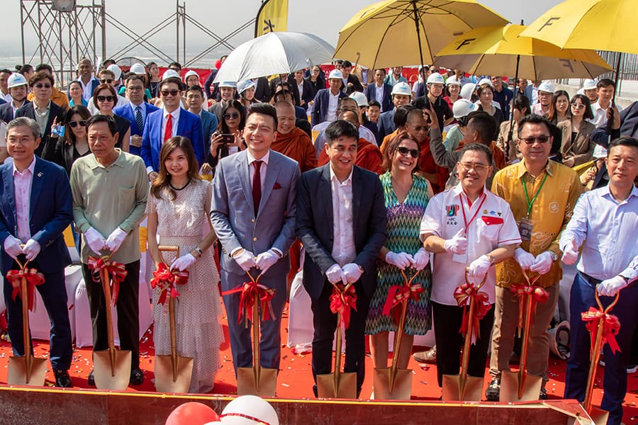 Urban Village Phase II topping out ceremony - Founders of Urban Village and VIP guests hold shovels to commemorate the official 'topping out' of the building